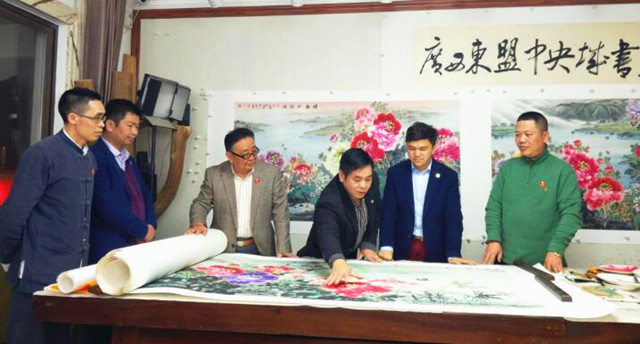  借东盟经济春风，发展民族文化事业